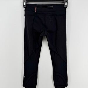 Lululemon Run Inspire Crop II Leggings Black Zip Pocket Mesh Size 4 Yoga